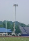 putting up the stadium lights at Erickson Field